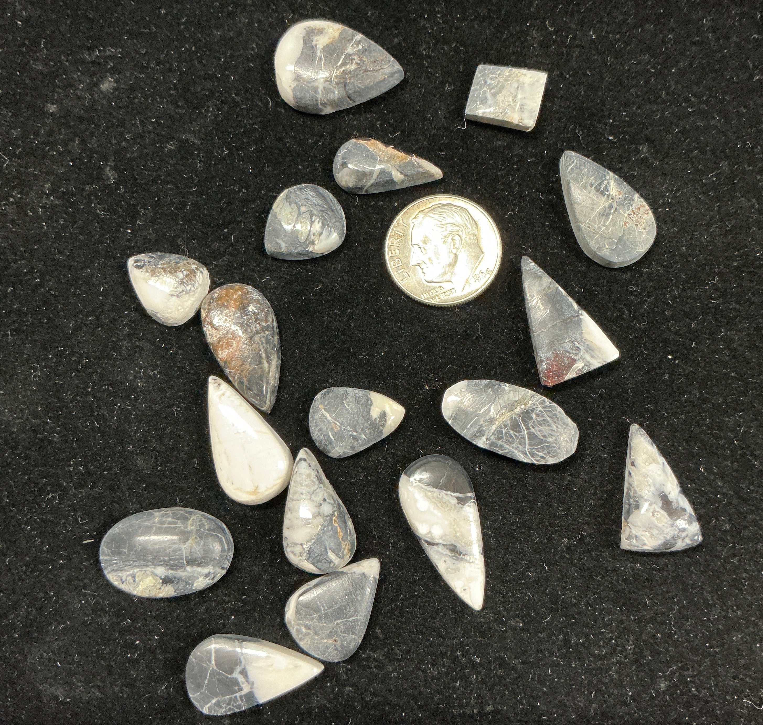White Buffalo Cabochons Lot. ~113 Carats. $141.25. Lot 7