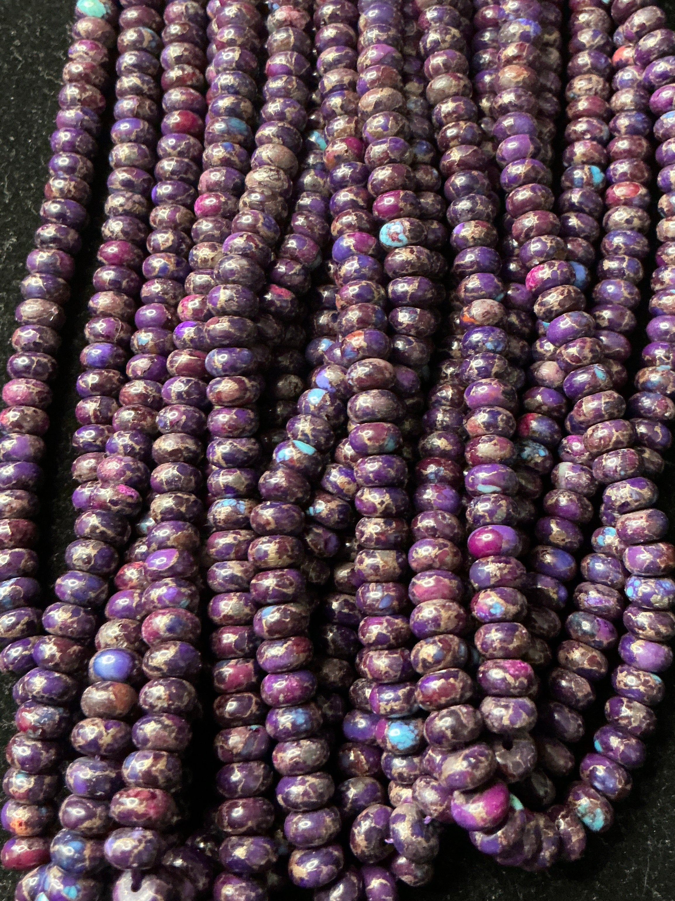 16” Strand of Purple Composite Rondelle Beads. 6mm. $28.