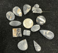 White Buffalo Cabochons Lot. ~91 Carats. $113.75. Lot 10.