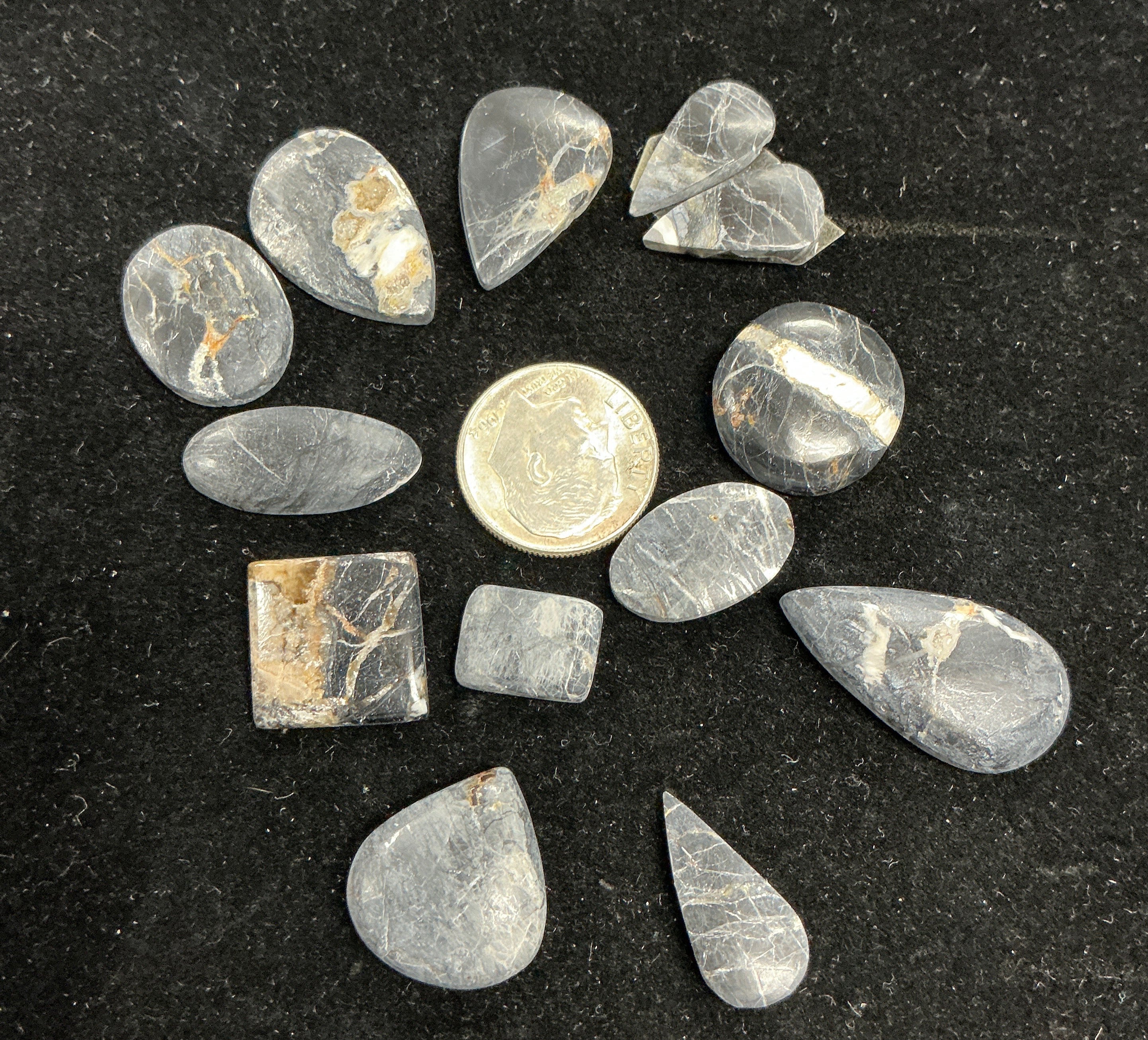White Buffalo Cabochons Lot. ~91 Carats. $113.75. Lot 10.