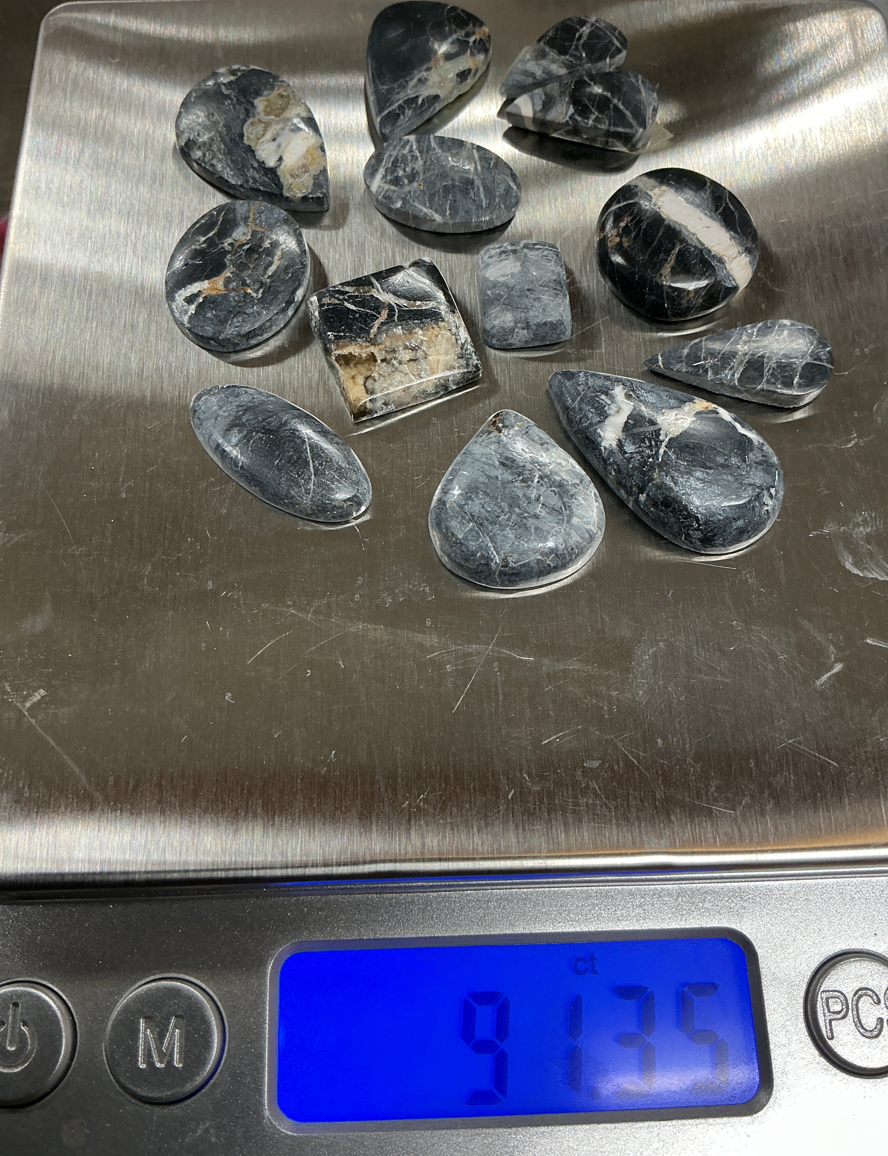 White Buffalo Cabochons Lot. ~91 Carats. $113.75. Lot 10.