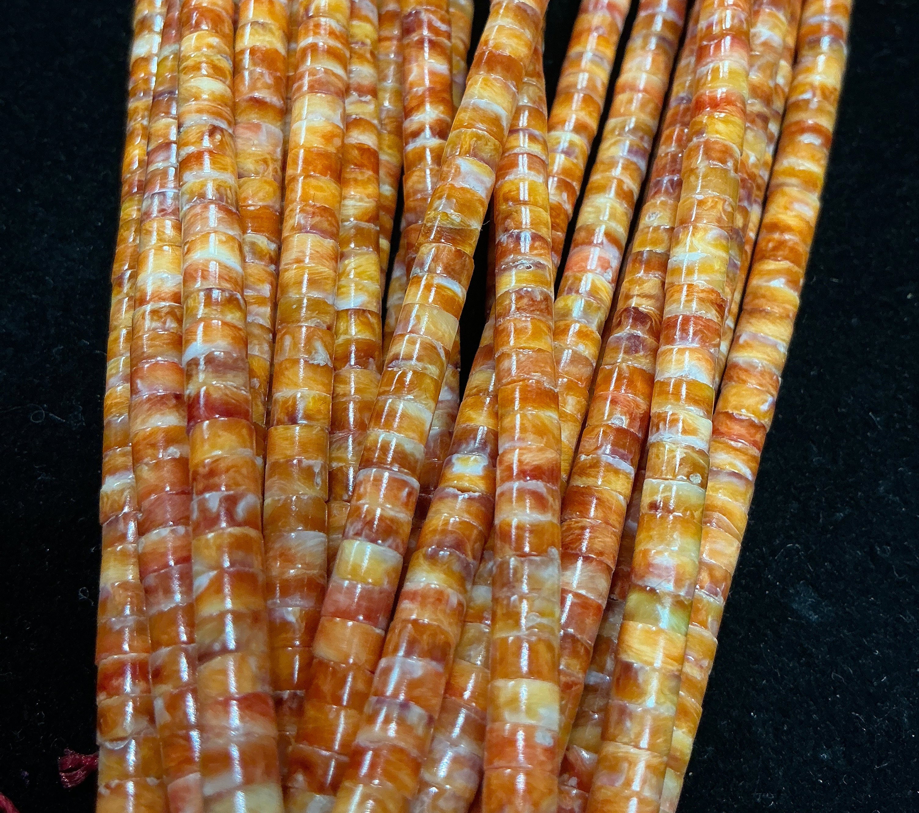 16” Orange Spiny Heishi Bead Strand. $44.