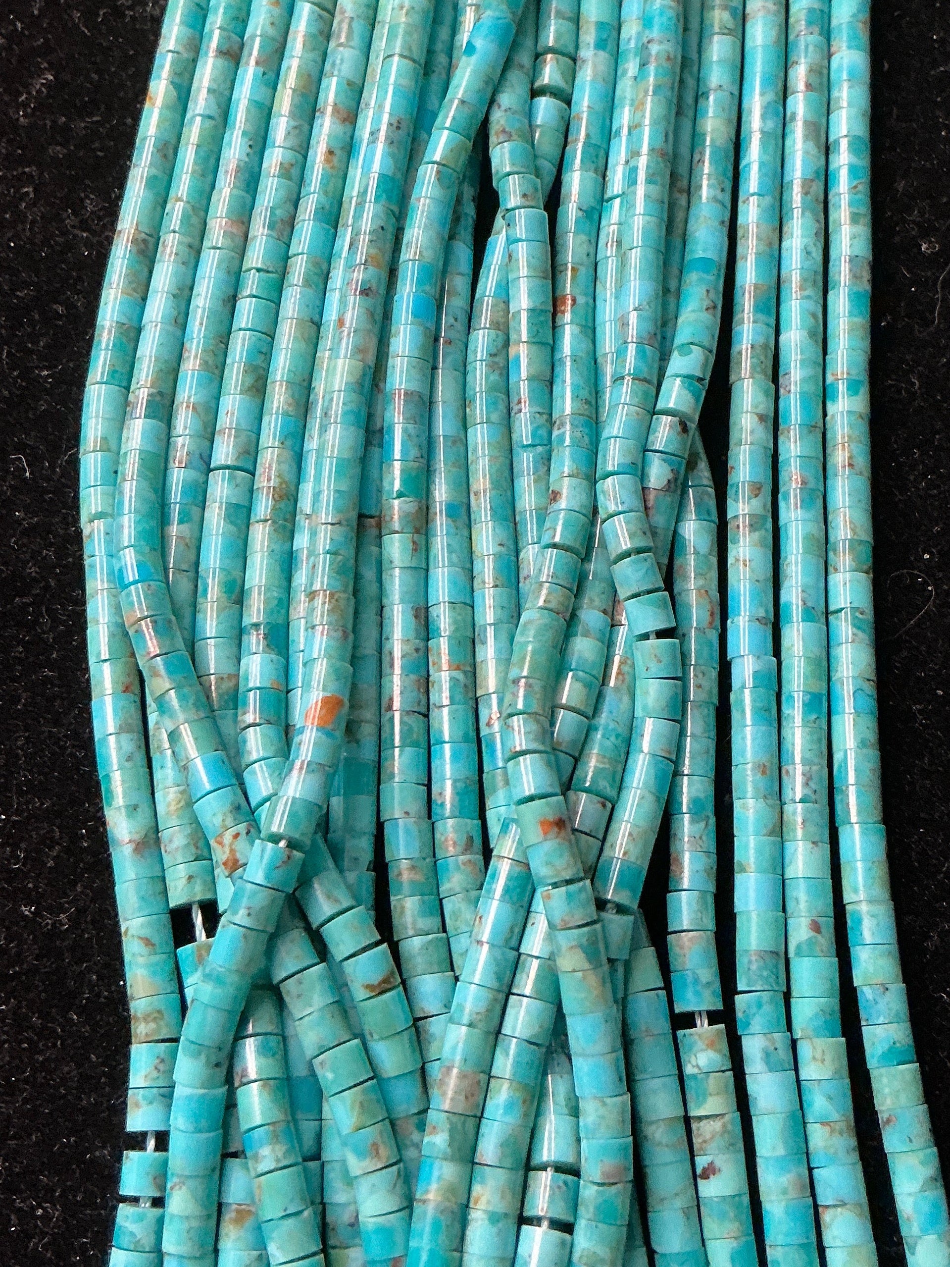 16” Strand of Turquoise Heishi Beads. 3mm. $25.