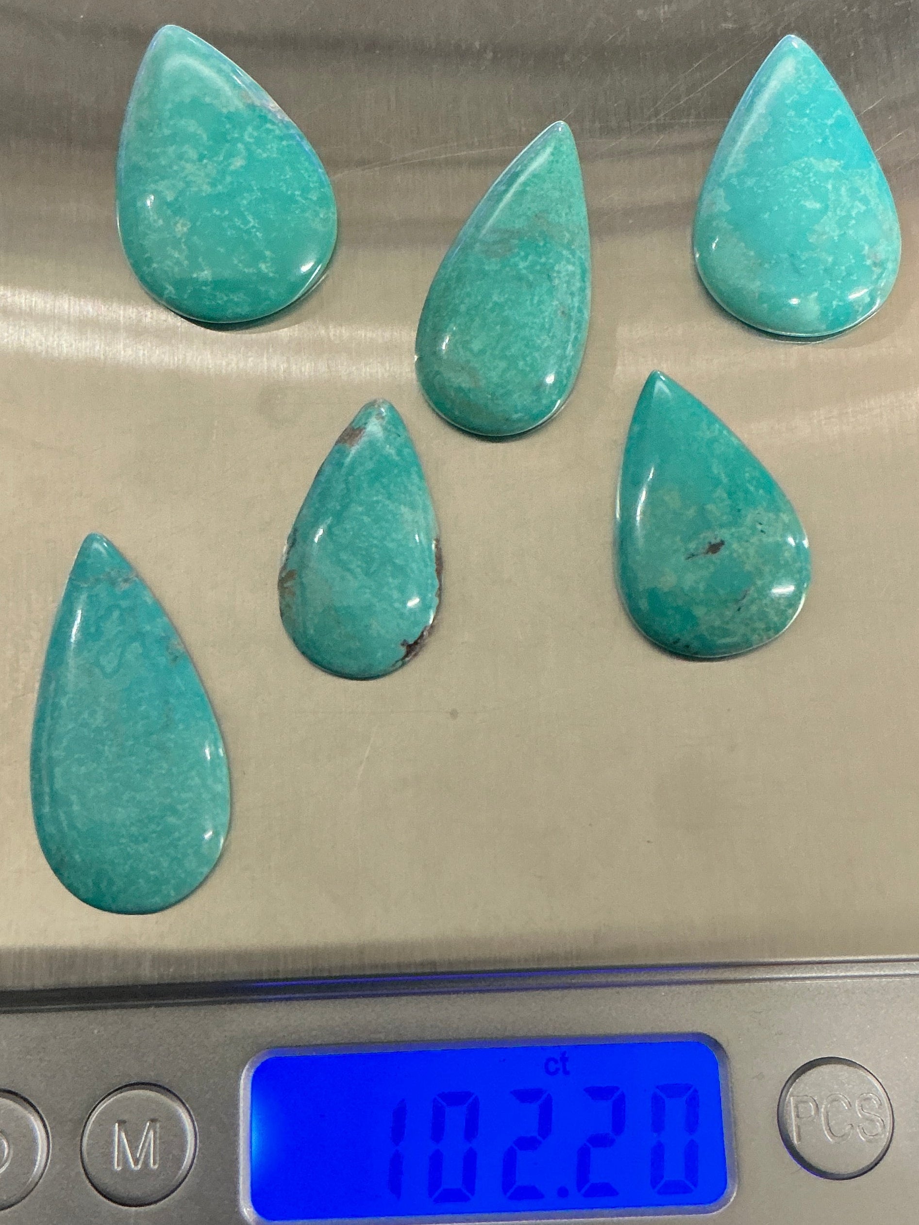 100 CTS Pear Shaped Turquoise Cabochons. Lot 6