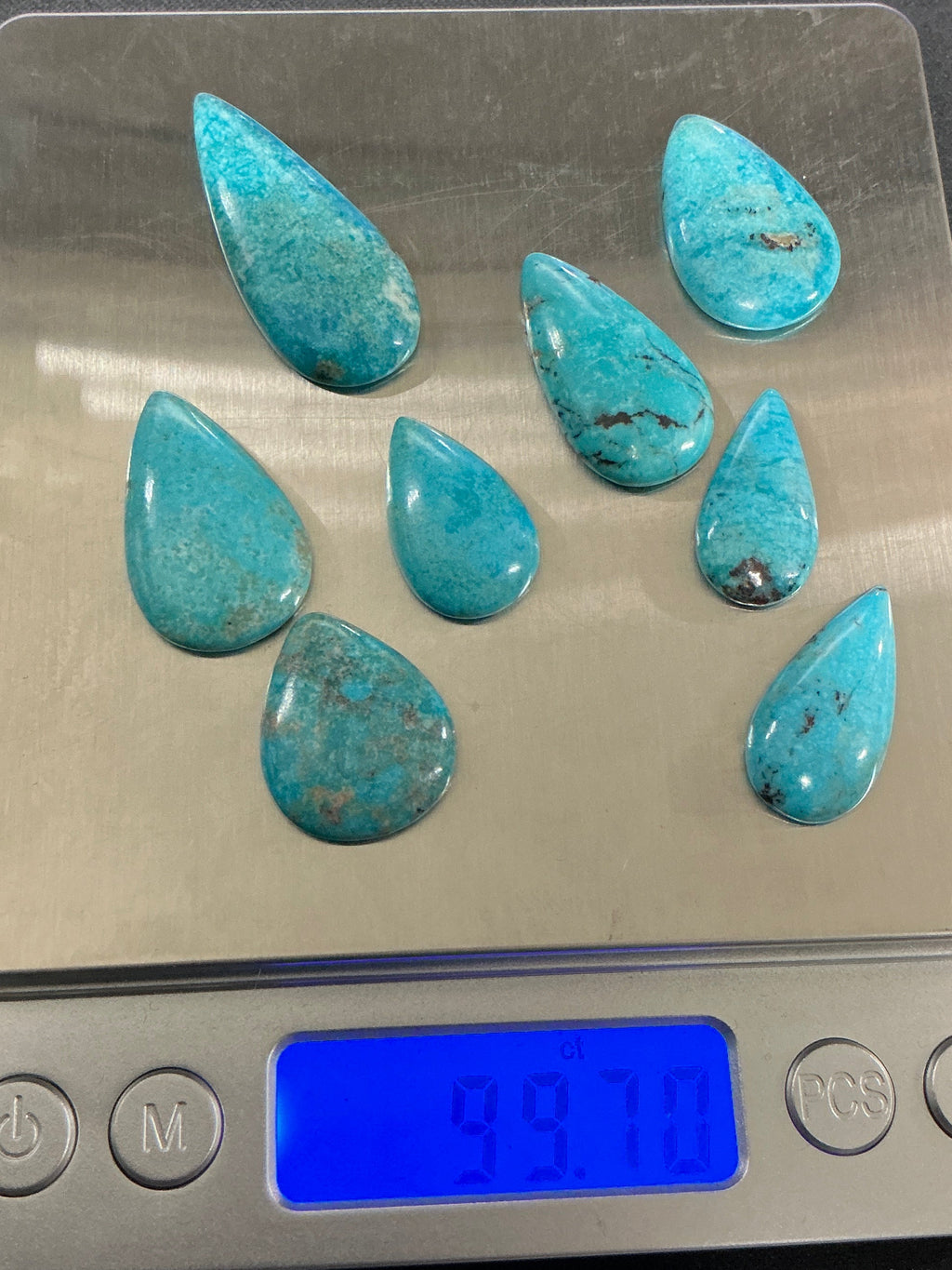 100 CTS Pear Shaped Turquoise Cabochons. Lot 8