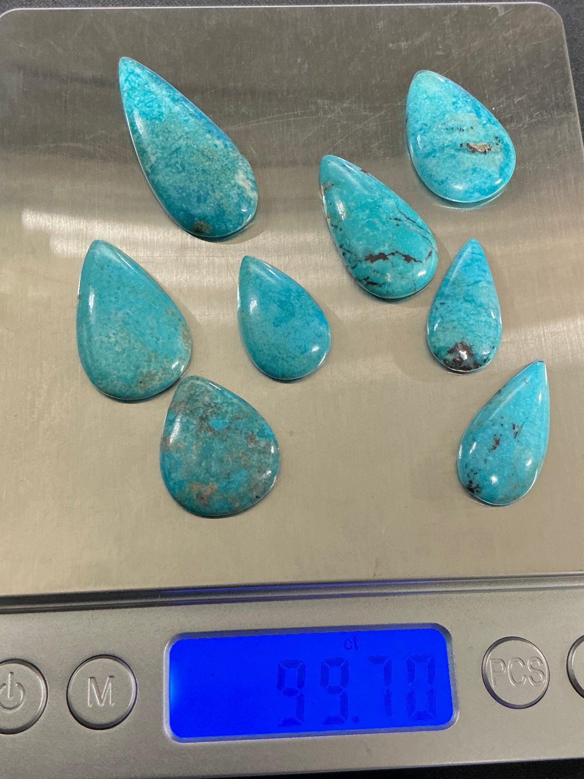100 CTS Pear Shaped Turquoise Cabochons. Lot 8